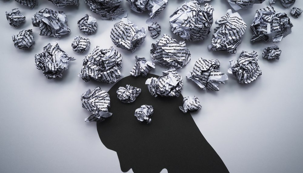 Silhouette of depressed and stressed person head.