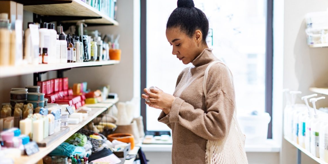 Young African woman shopping in zero waste store