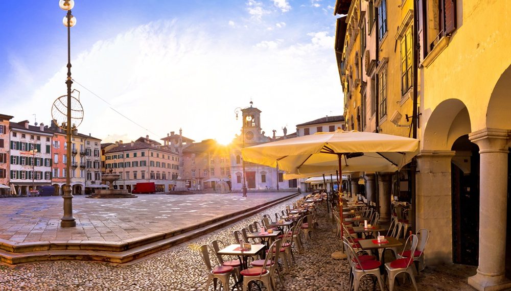 Piazza San Giacomo in Udine sunset panoramic view, town in Friuli Venezia Giulia region of Italy